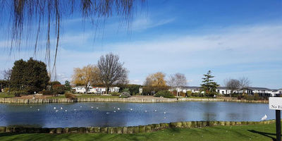 Kings Park Village across the lake